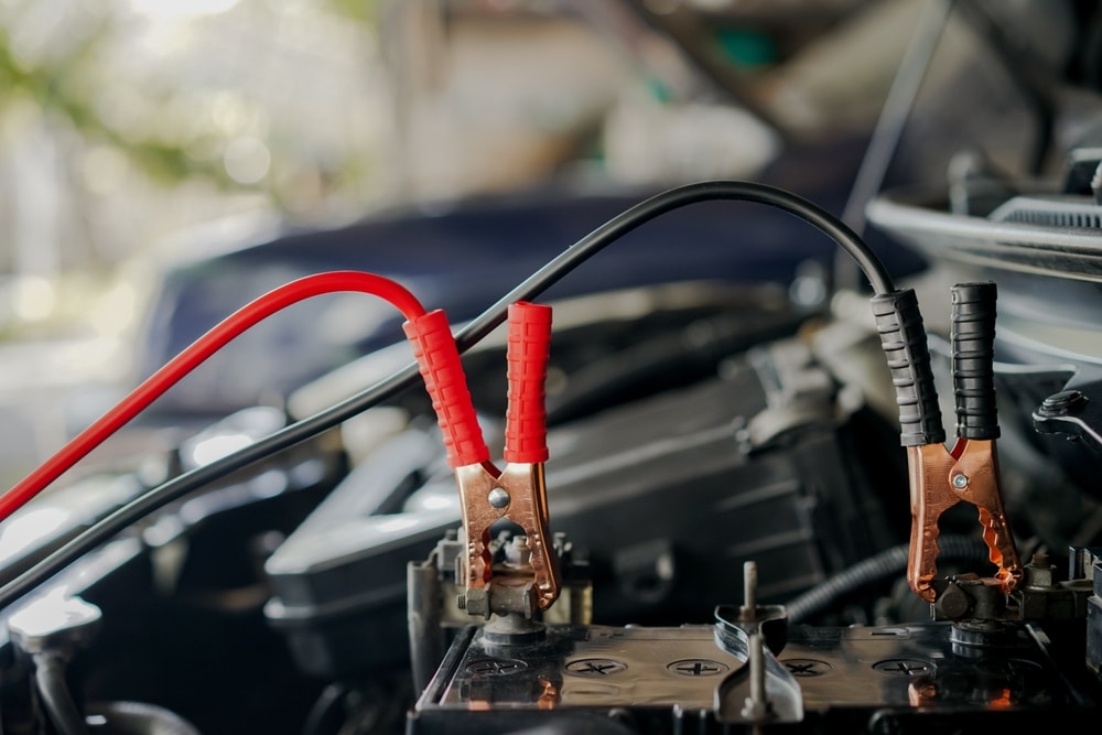 Close up Of Car Charger Cable Jump Starting A Dead Car